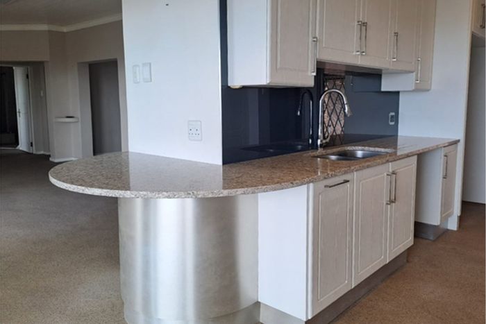 Versatile house in Blue Horizon Bay for sale, features ocean views and separate quarters.