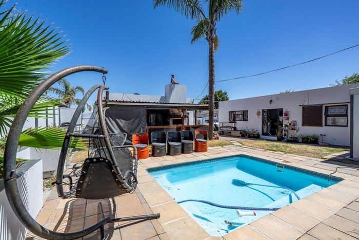 For Sale: Spacious 5-bedroom house in Protea Heights with pool and ample parking.