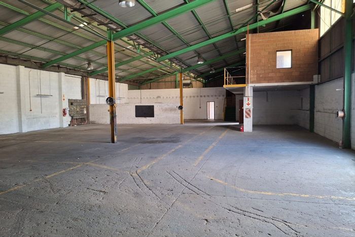 Industrial warehouse in Korsten to rent: 250-amp power, wash bay, upstairs offices.