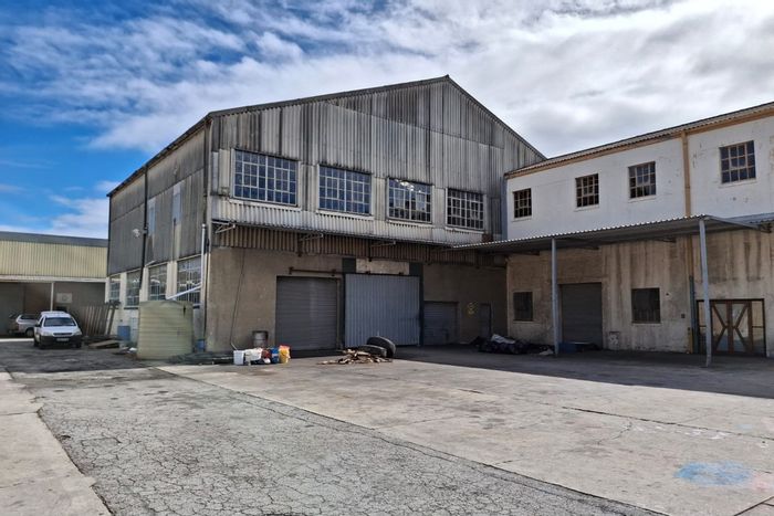 Industrial warehouse with offices, yard space, and 24-hour security in Korsten. To Rent.