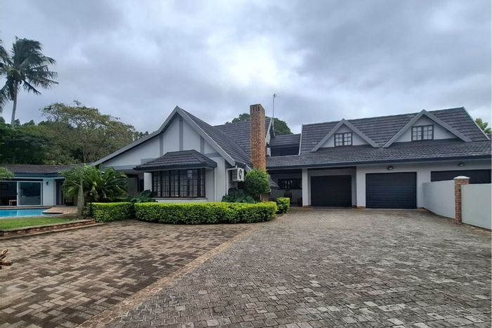 For Sale: Spacious 7-bedroom house with pool, flats, and solar system in Kwambonambi Central.