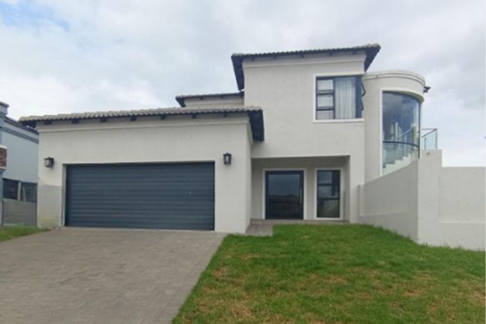 For Sale: House in Blue Valley Golf Estate with 4 bedrooms, entertainment patio, and staff quarters.