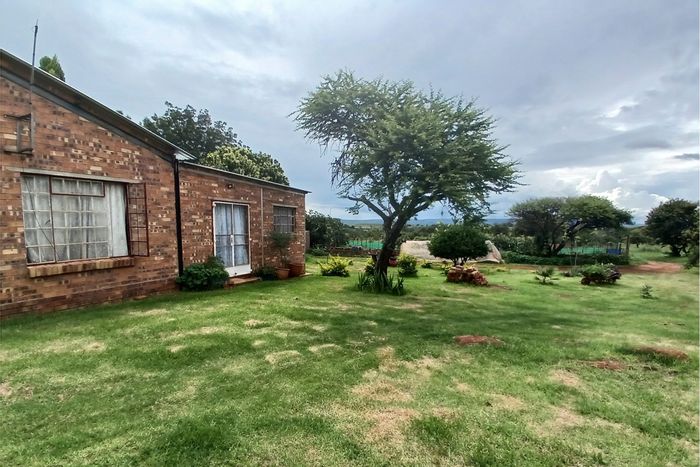 53.09 Hectare Farm For Sale in Roossenekal AH with multiple residences and irrigation.