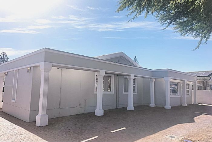 Office To Rent in Table View: 8 offices, reception, kitchen, outdoor area, prime location.