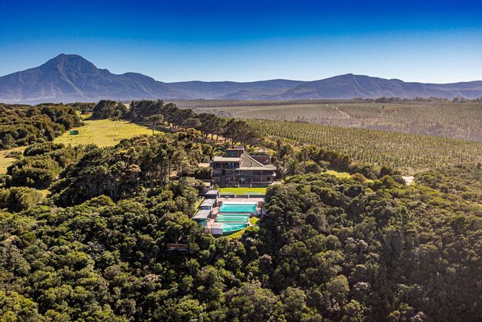 For Sale: Tsitsikamma Farm with coastline, lodge, cottages, pools, and farmland.