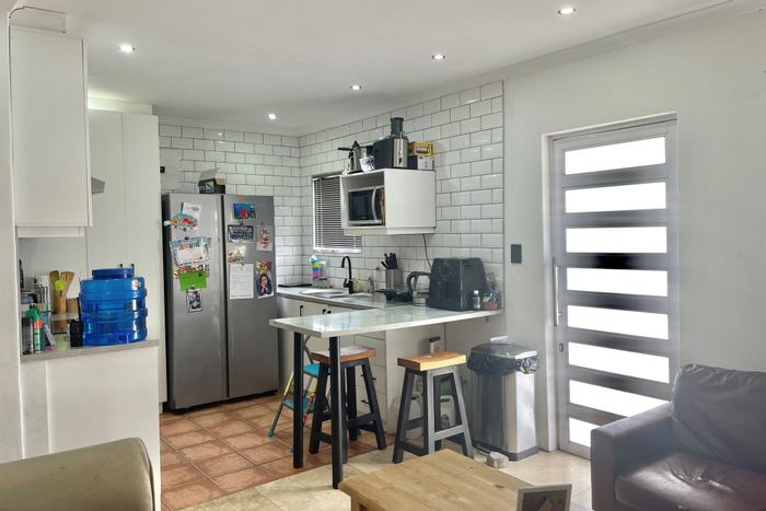 For Sale: Strandfontein House with 2 Bedrooms, Driveway, and Spacious Yards.