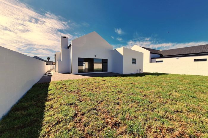 Coastal house for sale in Britannia Bay, steps from Golden Mile Beach.