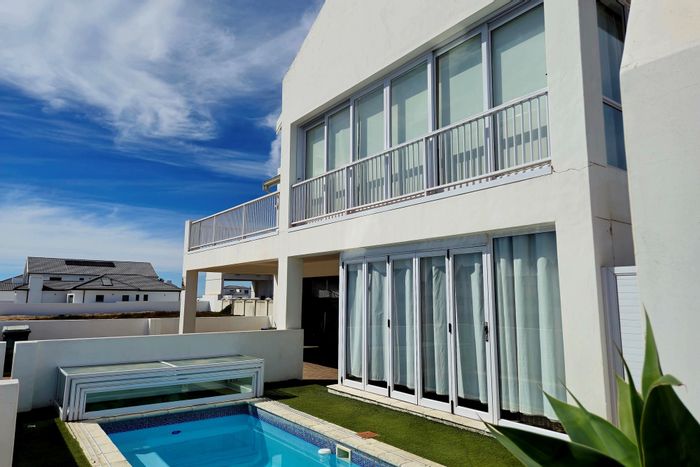 4-Bedroom House For Sale in Sandy Point Beach Estate with Pool and Beach Access