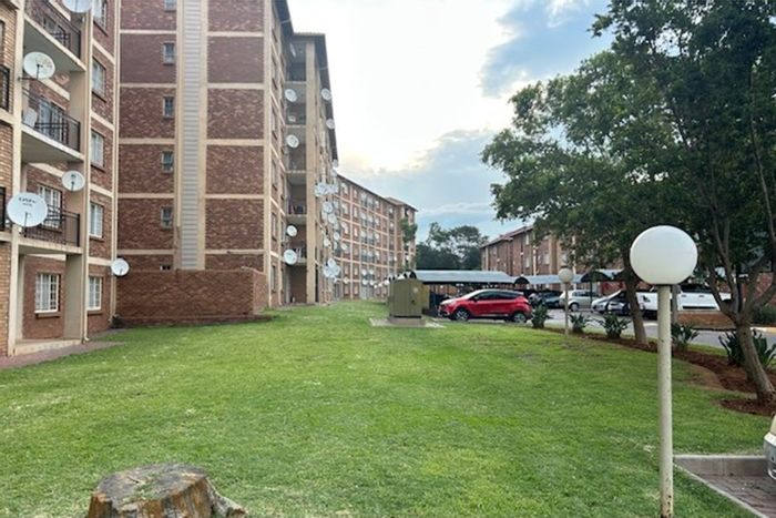 Karenpark Townhouse For Sale: 2-bed, 1-bath, secure estate, close to amenities.