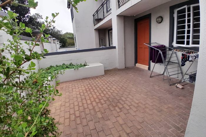 2-Bedroom Apartment To Rent in Parklands East with private garden and garage.