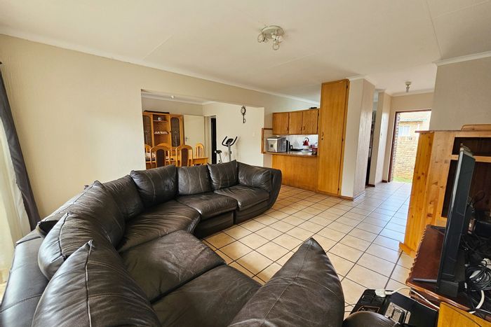 For Sale: Clubview Townhouse with private garden, garage, and convenient access.