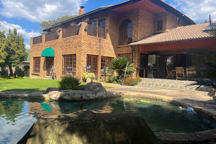 For Sale: Spacious 5-bedroom house in Witkoppen with pool, study, and solar features.