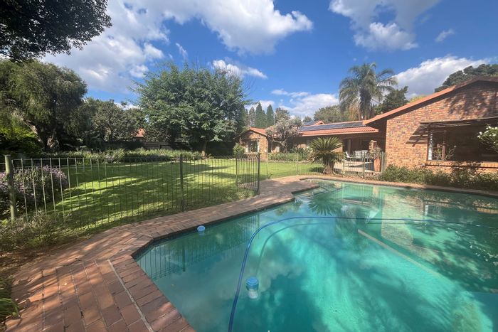For Sale: Spacious Douglasdale house with pool, garages, staff quarters, and security.