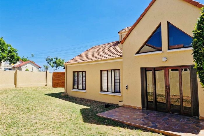 For Sale: Barbeque Downs Townhouse with 4 bedrooms, double garage, and large yard.
