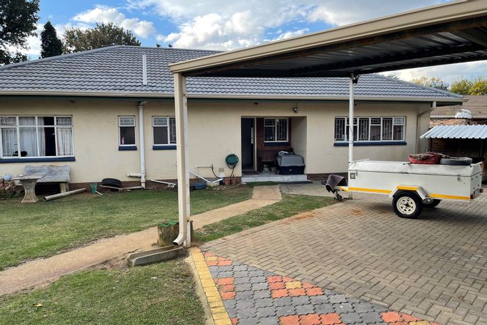 For Sale: House in Kriel Central with 3 bedrooms, carport, and rental potential.