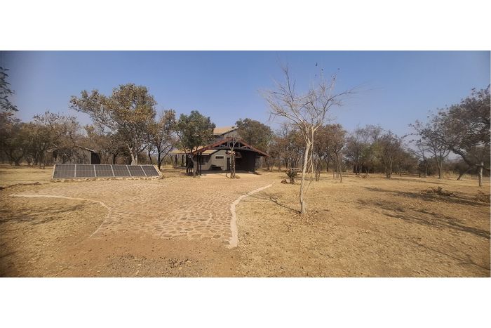 For Sale: House in Highlands Wilderness Estate with solar power, braai area, and garden cottage.