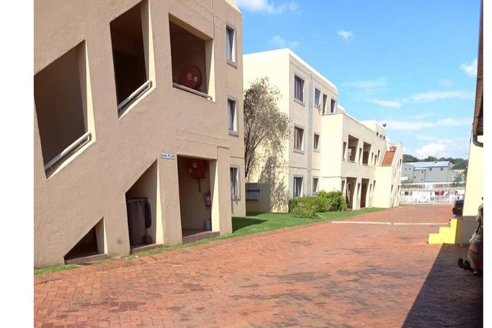 1-Bedroom Apartment For Sale in Weltevreden Park with pool and secure parking.