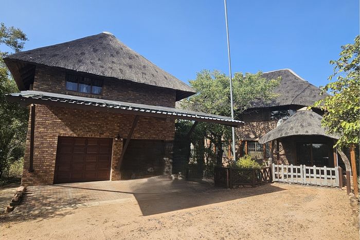 Marloth Park Central House For Sale: 5 beds, solar panels, spacious outdoor areas.