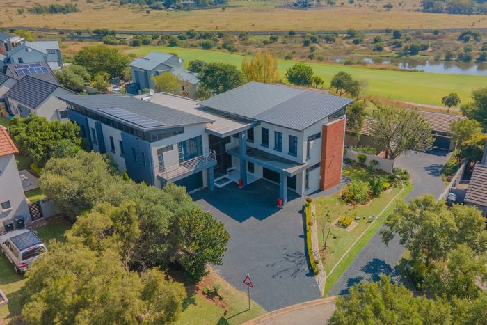 For Sale: House in Copperleaf Estate with pool, guest suite, and golf views.