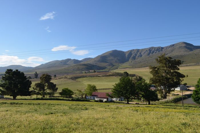 For Sale: 661 HA Farm in Uniondale Central with multiple structures and water rights.