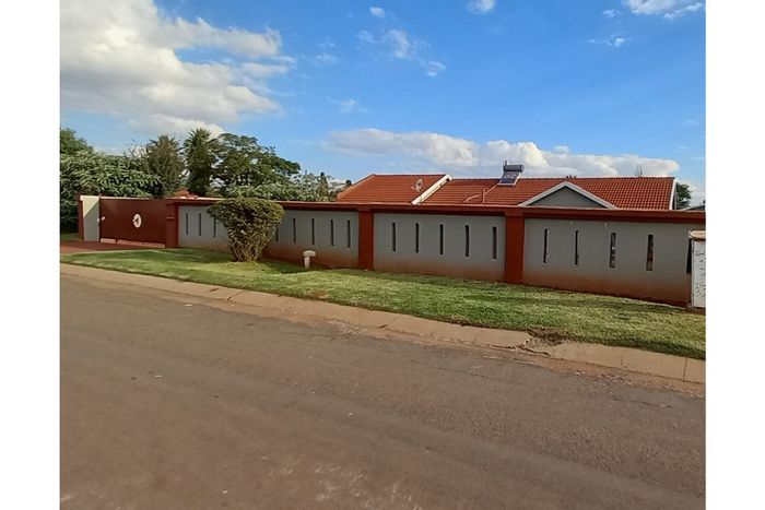 For Sale: House in Lenasia South with 3 bedrooms, double garage, and development potential.