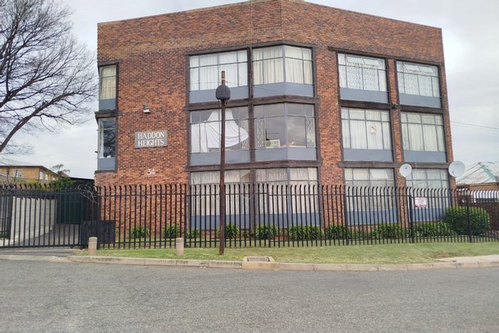2-Bedroom Apartment in Haddon For Sale with Balcony and Covered Parking.