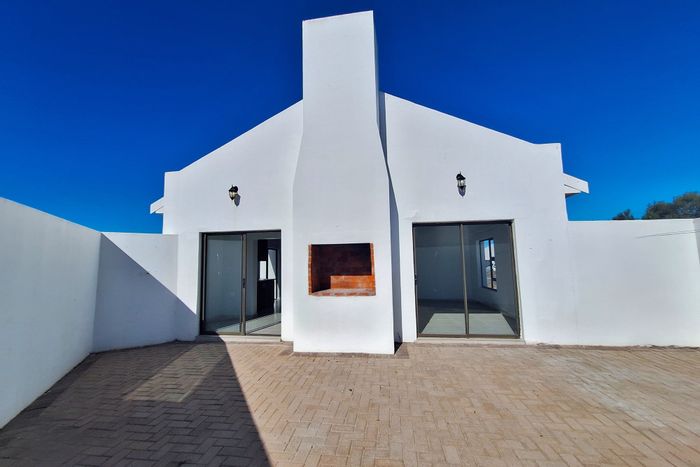 House for Sale in Shelley Point: 3 beds, braai patio, golf estate amenities.