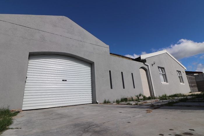 Spacious 5-bedroom house in Strandfontein, featuring dual living and ample parking. For Sale.
