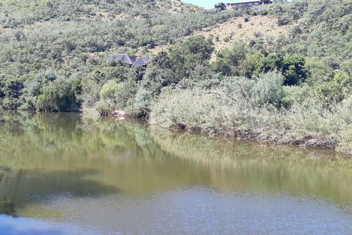 Developable flat erf with fenced area, utilities, and lapa in Presidentsrus. For Sale.