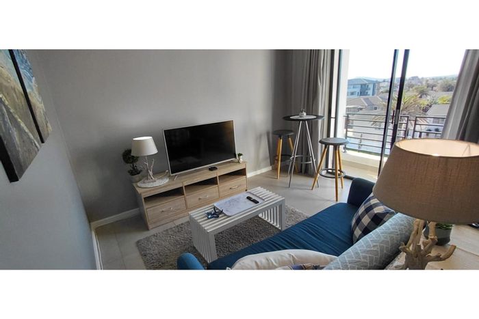 Beachfront Apartment To Rent: 1 Bed, WiFi, Pool, Secure Parking, Balcony Views.