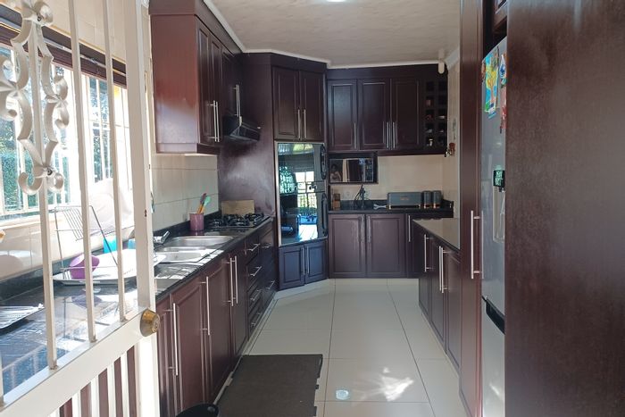 For Sale: Spacious 5-Bedroom House in Kloof Central with multiple lounges and study.