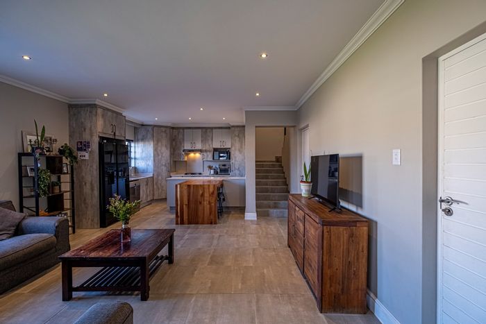For Sale: 4 Bedroom Townhouse in Westbrook with garage, braai area, and community pool.