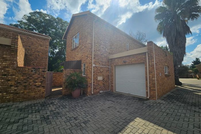 For Sale: Townhouse in Wierda Park with garden, lapa, garage, and 24-hour security.