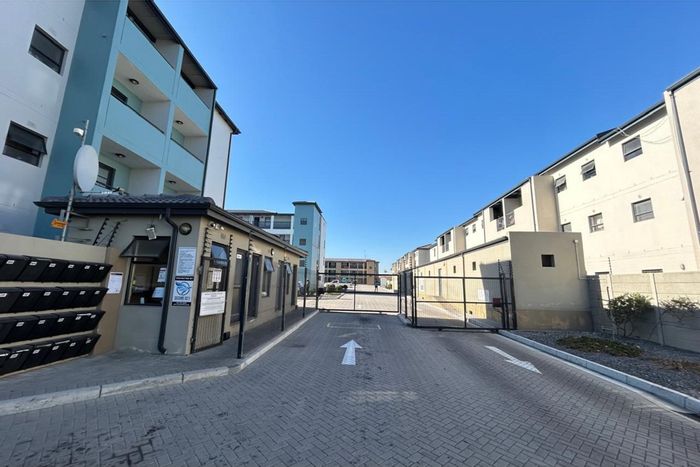 For Sale: Apartment in Parklands with 2 bedrooms, private yard, and secure parking.