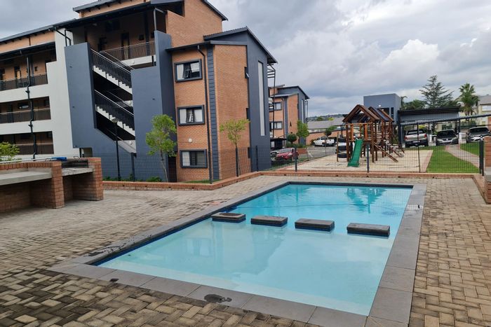 2-Bedroom Apartment To Rent in Vorna Valley with pool, braai area, and security.