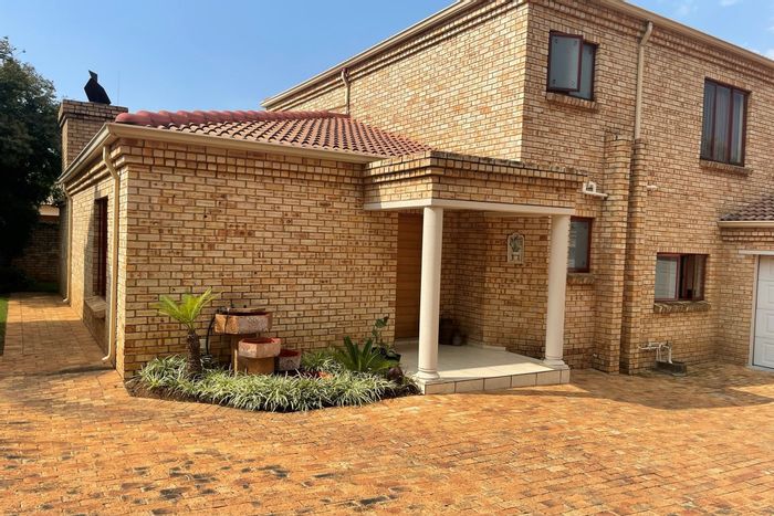 For Sale: Spacious 4-Bedroom House in Ruimsig with Pool, Garden, and Security.