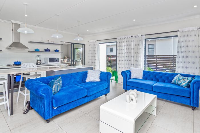 For Sale: 3-Bedroom Townhouse in Amorosa with garden, garage, and security features.