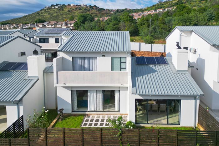 For Sale: 3-Bedroom Townhouse in Amorosa with garden, garage, and security features.