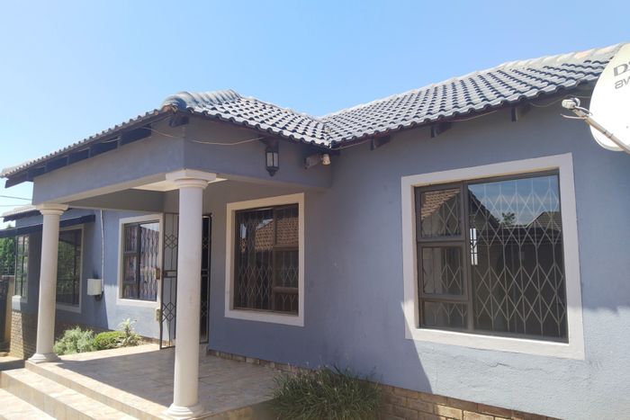 For Sale: Spacious 4-bedroom house in Cosmo City with garden and parking.