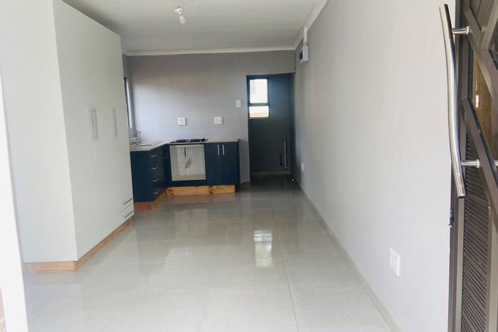 Cottage To Rent in Athlone Park: Open-plan, secure living with utilities included.