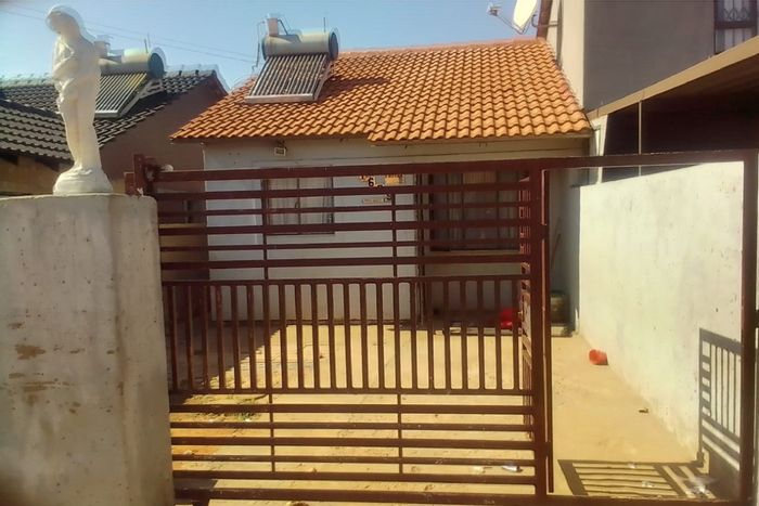 For Sale: Lufhereng House with 2 Bedrooms, Open Plan Living, Gated Parking.