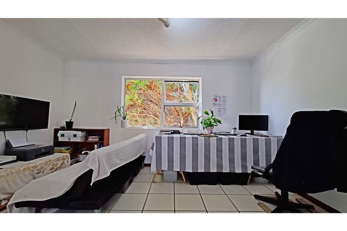 2-Bedroom Apartment For Sale in Anchorage Park with Security, Parking, and Amenities Nearby.
