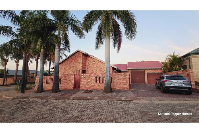 3 Bedroom Townhouse To Rent in Magalieskruin with garden, double garage, and staff toilet.