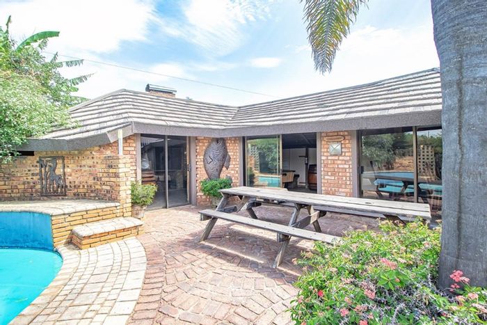 For Sale: Family home in Morganridge with pool, office, and ample parking.