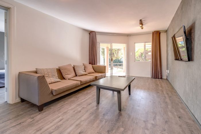 1-Bedroom Apartment For Sale in Bedfordview Central with garden, pool, and security.