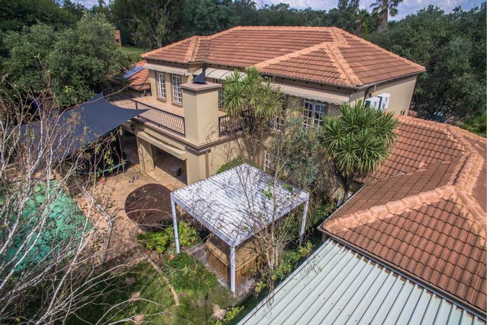 For Sale: Spacious 4-Bedroom House in Ruimsig with Pool and Large Garage.