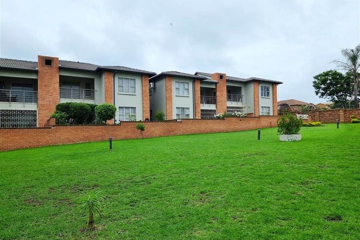 Two-bedroom apartment in Noordwyk with balcony, pool, and security features. To Rent.