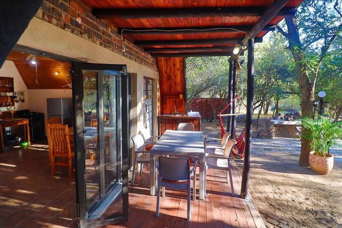 For Sale: House in Marloth Park Central with two chalets, pools, and parking.