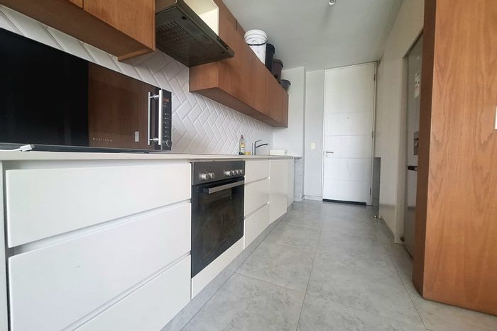 For Sale: 2-Bedroom Apartment in Ballito Commercial District with rooftop pool and security.