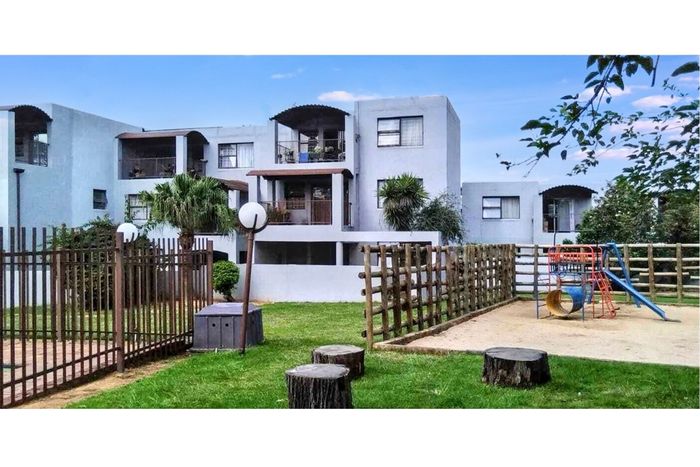 For Sale: Apartment in Vorna Valley with balcony, pool, braai area, and garage.